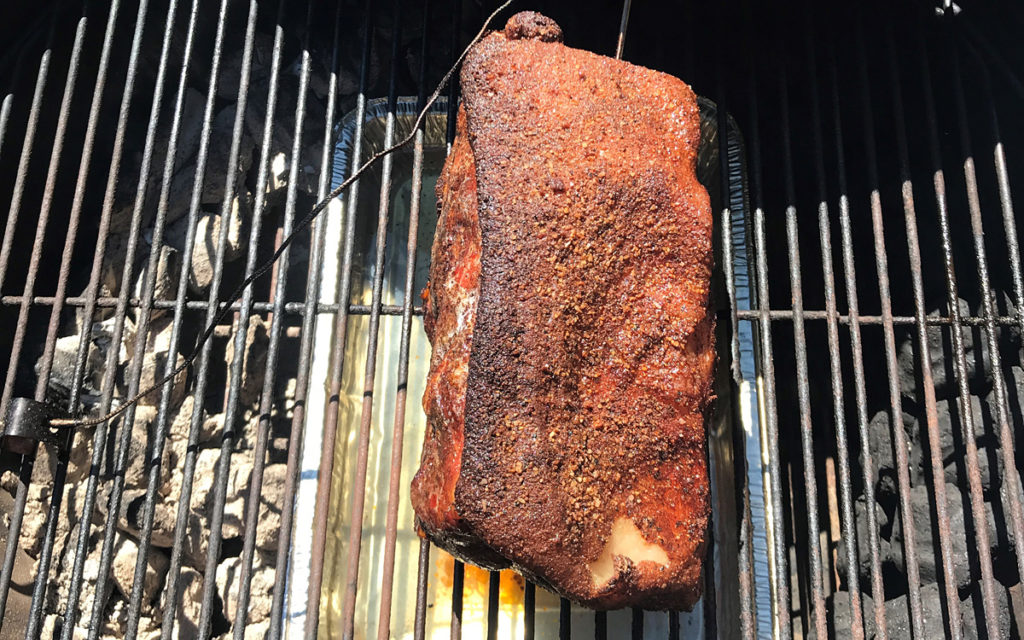 Smoking a pork butt using the snake method
