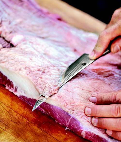 Trimming fat off the Brisket