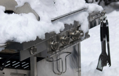 Grill covered in snow